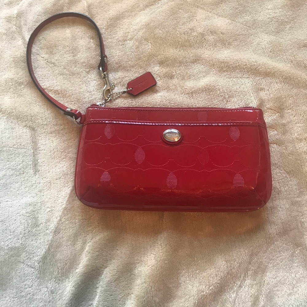 100% auth COACH glossy red wristlet clutch.